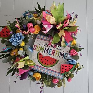 Colorful Summer Wreath with Ribbons and Flowers
